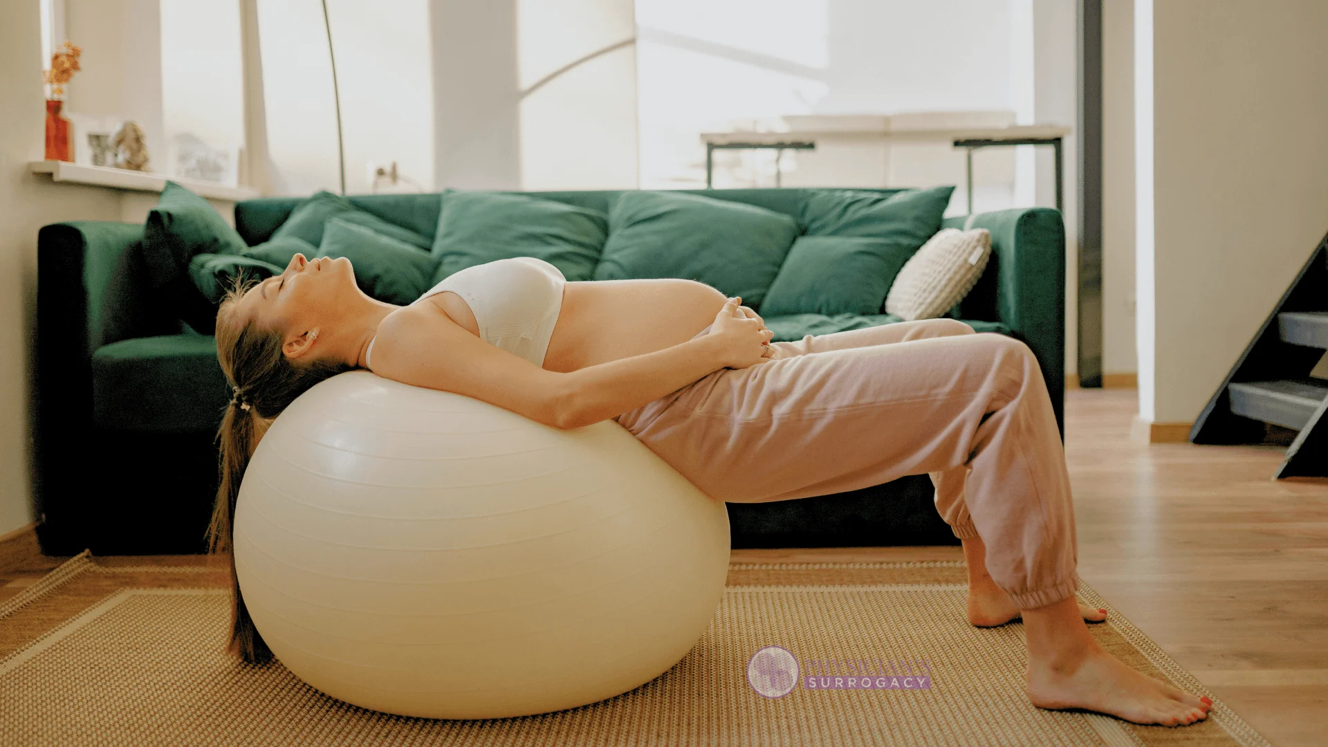 physicians-surrogacy-surrogate-doing-prenatal-exercise-with-birthing-ball